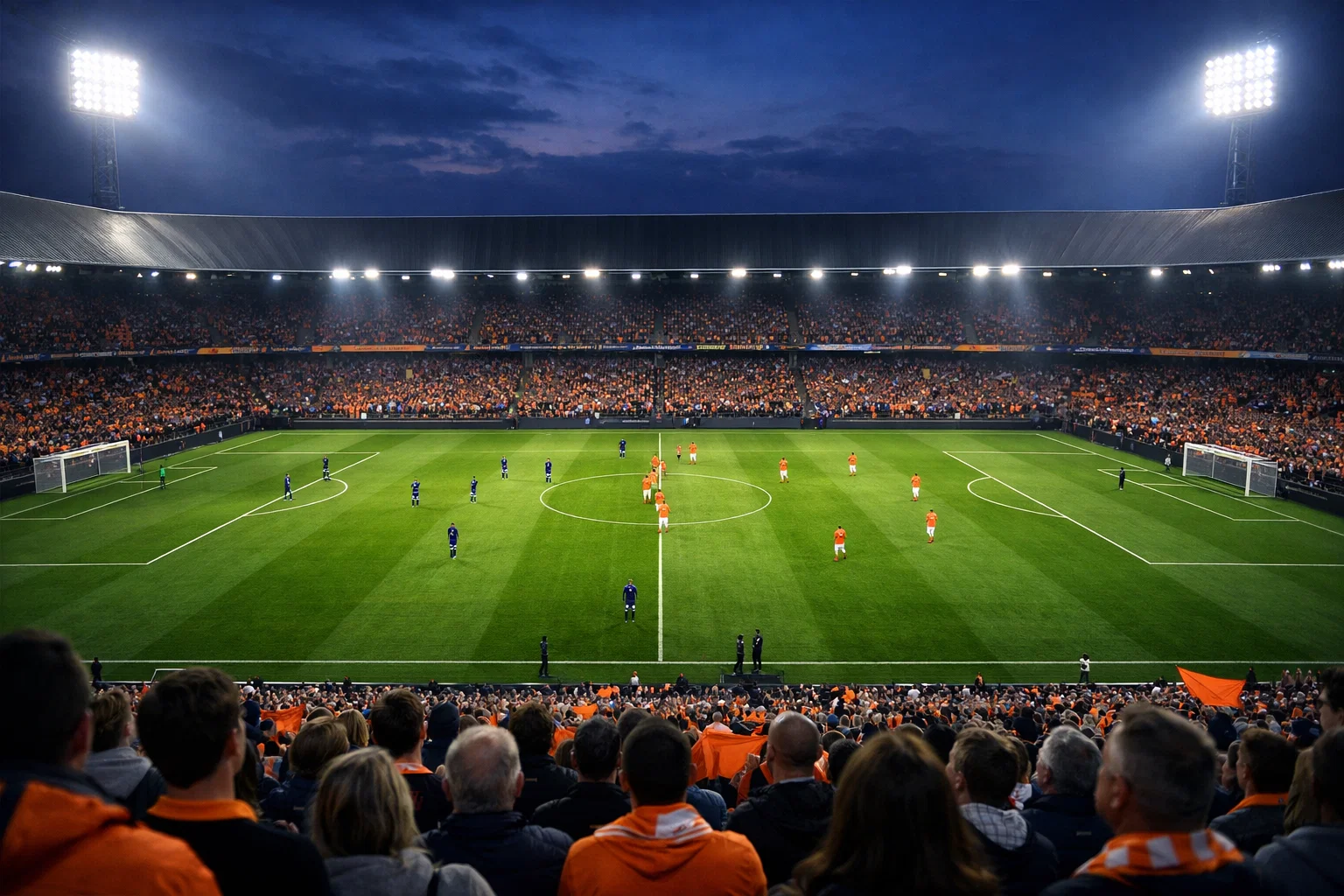 Sfeervolle Nederlandse voetbalstadion tijdens Eredivisie wedstrijd